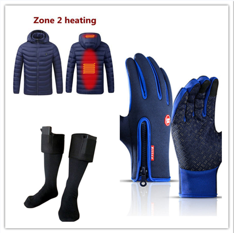 Blue winter gloves with zippers, black heated socks, and a heated blue jacket, showcasing winter sports gear.