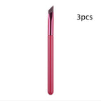 A 3-pack of pink angled eyebrow brushes with metallic ferrules and thin, precise bristles for detailed application.