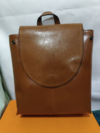 Brown genuine leather retro messenger backpack with a rounded flap, top handle, and side snap-button details.