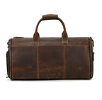 Vintage brown leather travel duffle bag with top carry handles, external side pockets, and durable zipper closures.