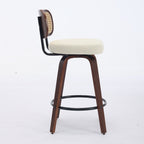 A swivel counter stool with a walnut wood finish, cane backrest, and beige upholstered seat on a white background.