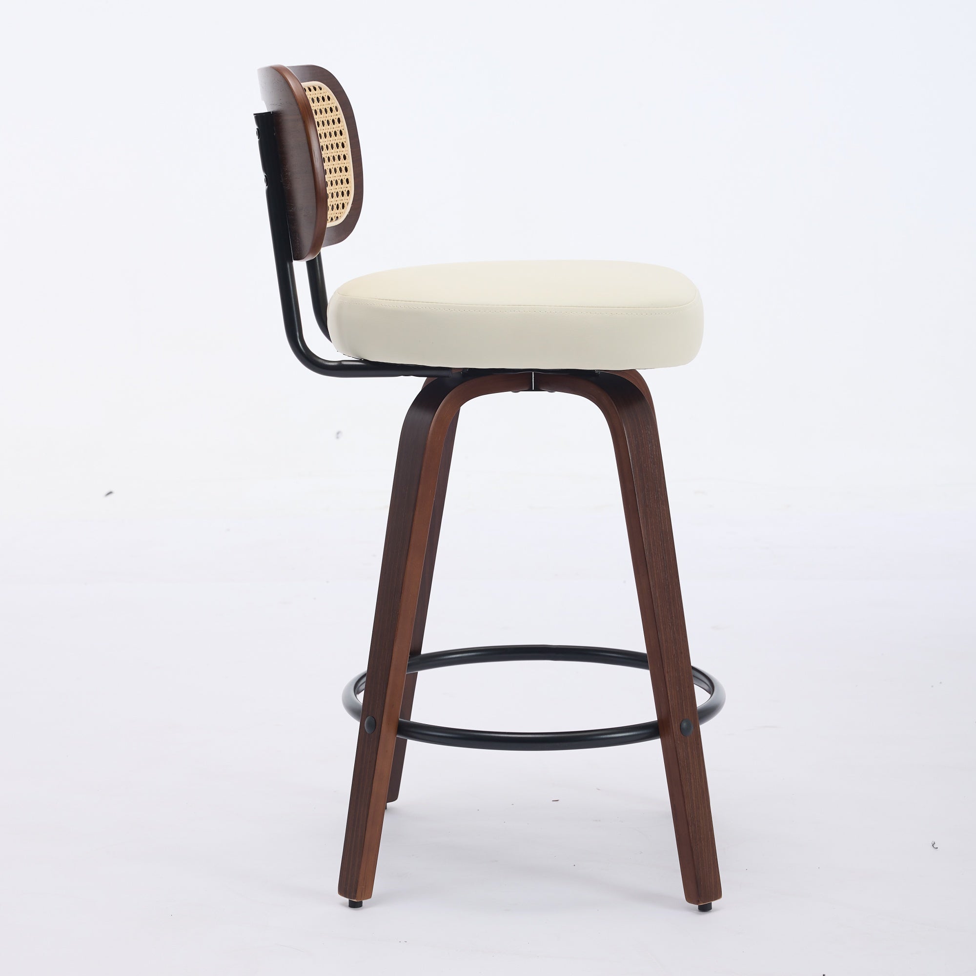 A swivel counter stool with a walnut wood finish, cane backrest, and beige upholstered seat on a white background.