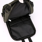 Open olive green multifunctional crossbody chest bag with black interior lining, multiple compartments, and D-rings.