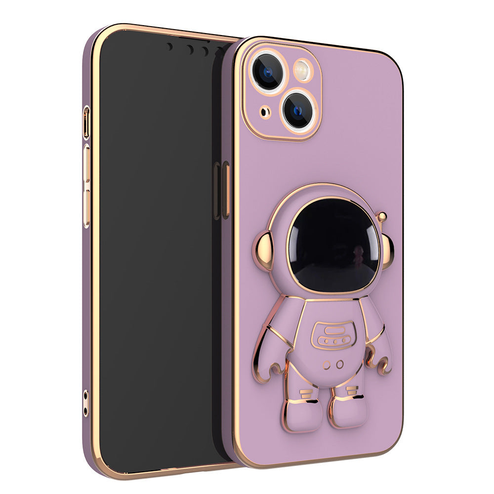 Purple phone case with gold electroplated trim and a 3D astronaut figure that serves as a kickstand.