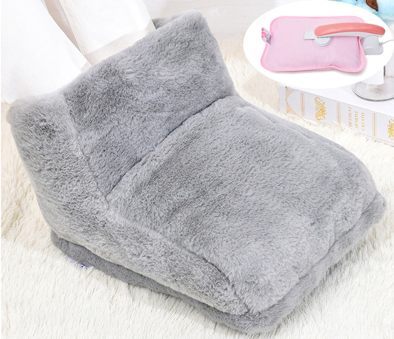 Gray plush electric foot warmer with a cozy fleece texture, featuring an inset of a pink, rechargeable hot water bag.