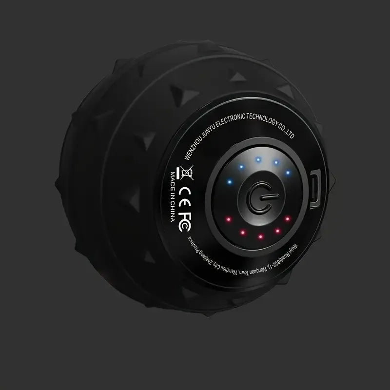 Black textured silicone massage ball with a center power button and glowing blue and red LED indicator lights.