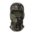 Tactical camouflage balaclava in green, brown, and black. Full-face synthetic fabric mask with an open-eye cutout.
