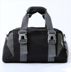 Black and grey fabric gym bag with two front buckles, top carry handles, and a sleek, sporty design.