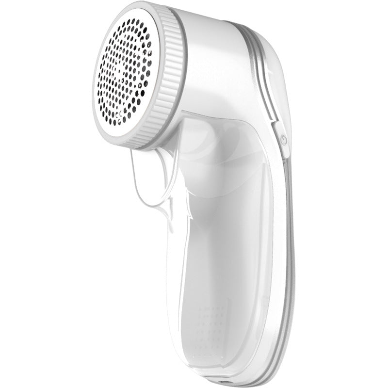Handheld white plastic fabric shaver with a metal mesh head and a transparent lint collection container.