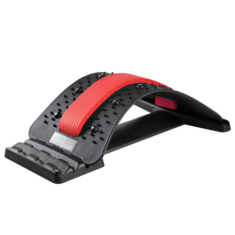Black arched lumbar back stretcher with a red foam spine cushion and acupressure nubs on a white background.