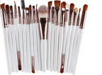 A set of Digitaldistribution375 makeup brushes with white handles, rose gold ferrules, and soft brown synthetic bristles.