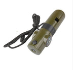 Olive green plastic 7-in-1 survival whistle with integrated compass, small light, and a black lanyard.