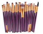 Digitaldistribution375 set: 20 makeup brushes with purple handles, gold ferrules, and soft synthetic bristles.