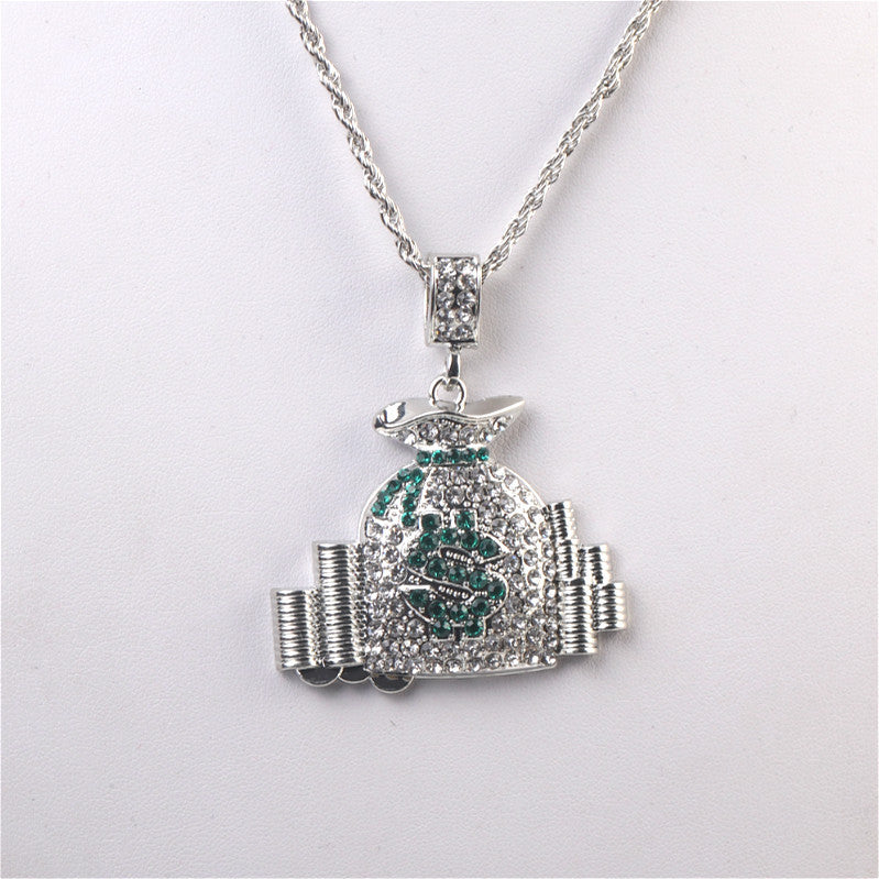 Silver-tone hip-hop money bag pendant necklace encrusted with white rhinestones and green dollar sign detailing.