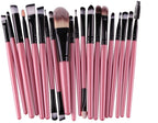 Digitaldistribution375 set of 20 makeup brushes with soft bristles, black ferrules, and metallic pink wooden handles.