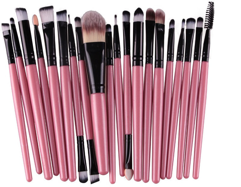 Digitaldistribution375 set of 20 makeup brushes with soft bristles, black ferrules, and metallic pink wooden handles.