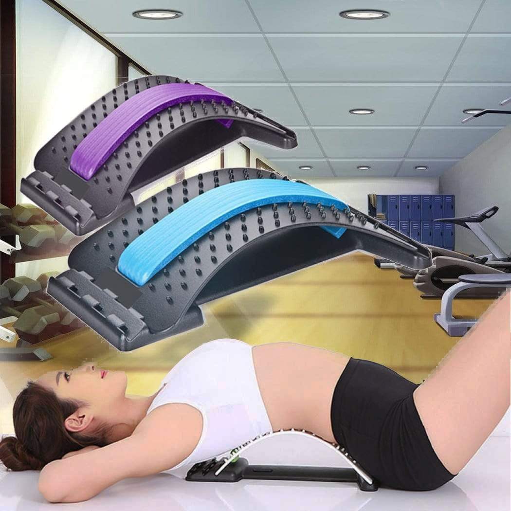 Two arched black plastic lumbar stretchers with blue or purple foam strips, used by a woman for back pain relief.