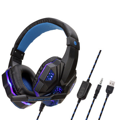 Black and blue gaming headphones with LED accents, padded ear cups, integrated microphone, and wired USB/jack connection.