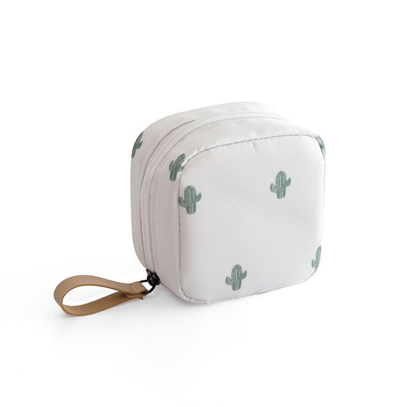 Small white square makeup bag with green cactus print, zipper closure, and a tan wrist strap. White background.
