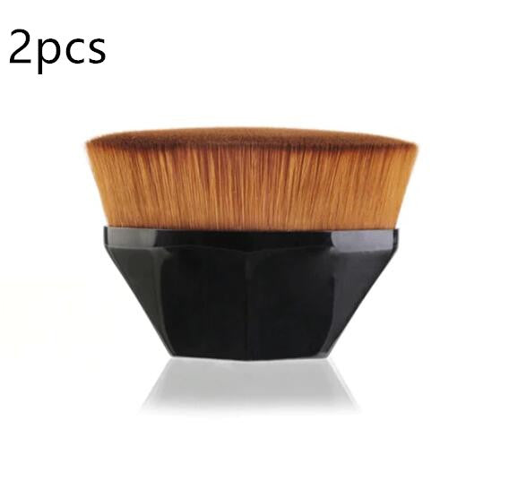 Set of two flat-top makeup brushes with soft brown synthetic bristles and ergonomic black diamond-shaped handles.