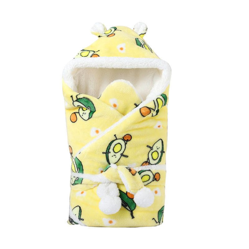 Yellow fleece baby swaddle with white sherpa lining, bear ears hood, and a cute avocado and egg print.