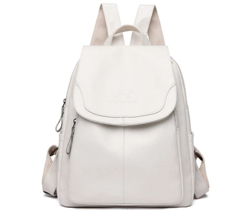 White soft leather backpack with a flap top, zip closure, and comfortable shoulder straps. Casual, minimalist style.