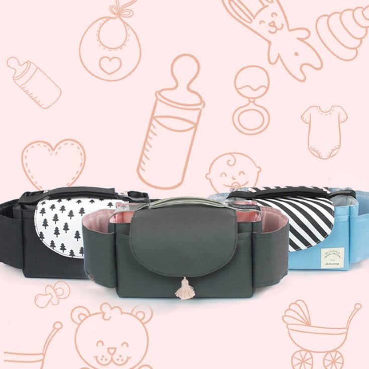 Three fabric baby stroller organizers in black, grey, and blue, featuring pockets, front flaps, and patterned accents.