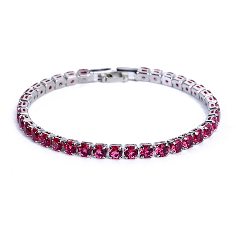 Silver-tone tennis bracelet featuring a continuous row of sparkling micro-inlaid round hot pink zircon stones.