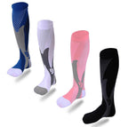 Four pairs of athletic compression socks in blue, white, pink, and black with textured patterns and contrast panels.