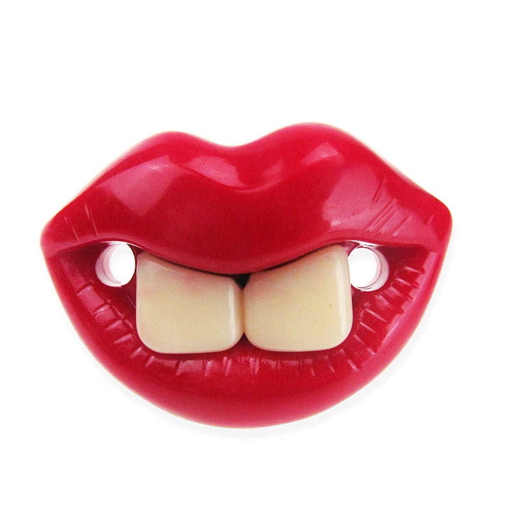 Funny baby pacifier by Digitaldistribution375 featuring glossy red lips and two large, white buck teeth.