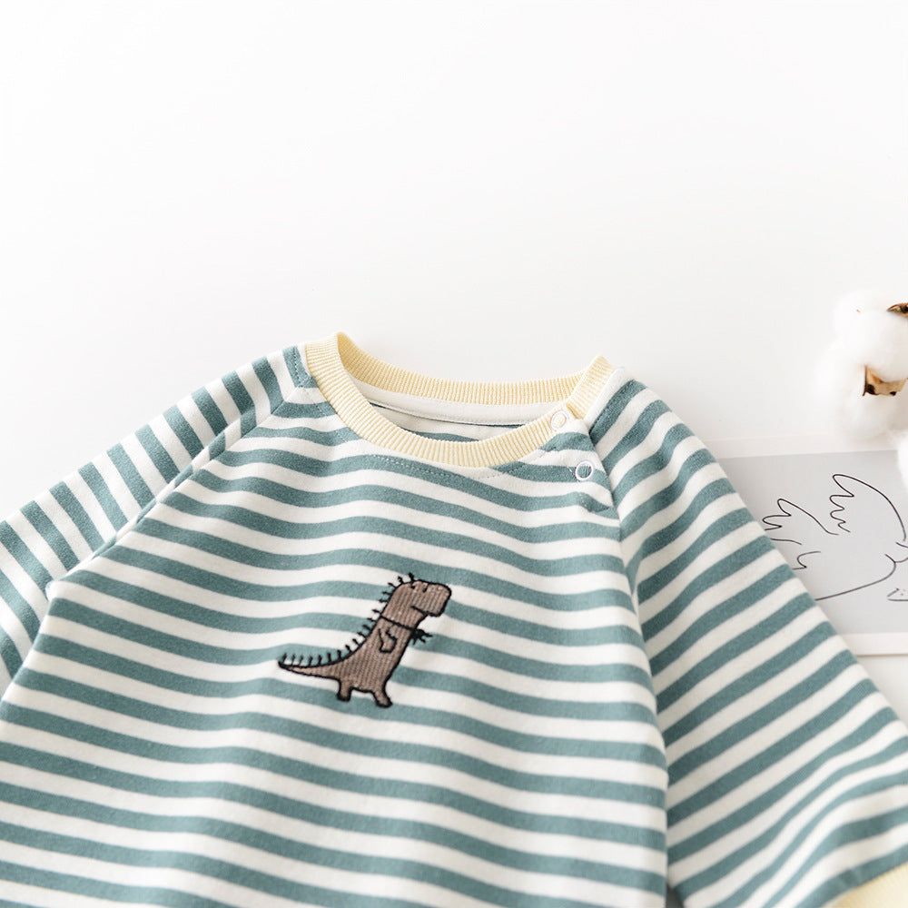 Baby's long-sleeve, teal and white striped jumpsuit with a small embroidered brown dinosaur and yellow crew neck.
