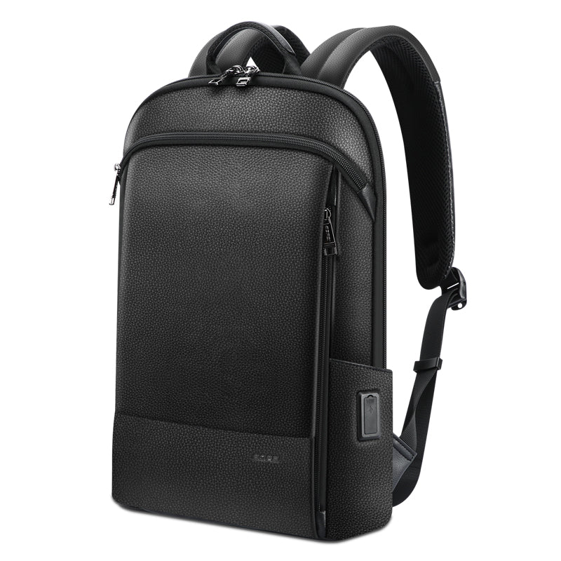 Black textured leather backpack with zippered compartments, padded straps, and a side USB charging port.