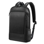 Black textured leather backpack with zippered pockets, adjustable straps, and a built-in USB charging port.
