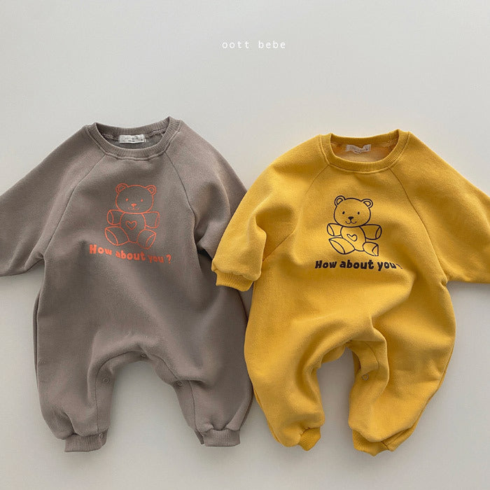 Two long-sleeve baby jumpsuits in taupe and yellow featuring a bear graphic and "How about you?" text.