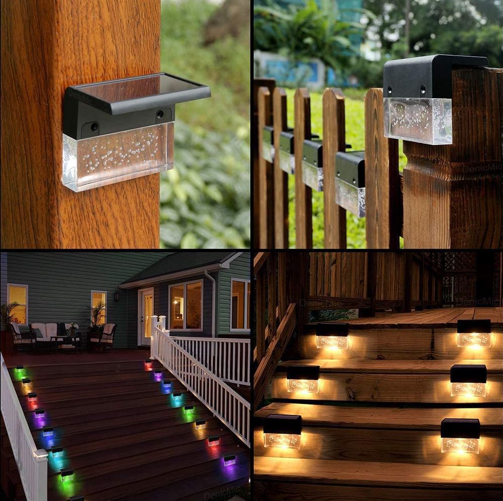Waterproof RGB solar LED step lights with bubble-effect clear glass and black casing, mounted on wooden decks and fences.