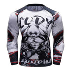 Long-sleeve compression shirt with a muscular panda graphic, "Cody Lundin" text, and red/black/white abstract accents.