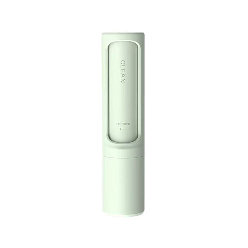 Light green portable pet hair lint roller with a sleek, cylindrical design and "CLEAN" text indicator.