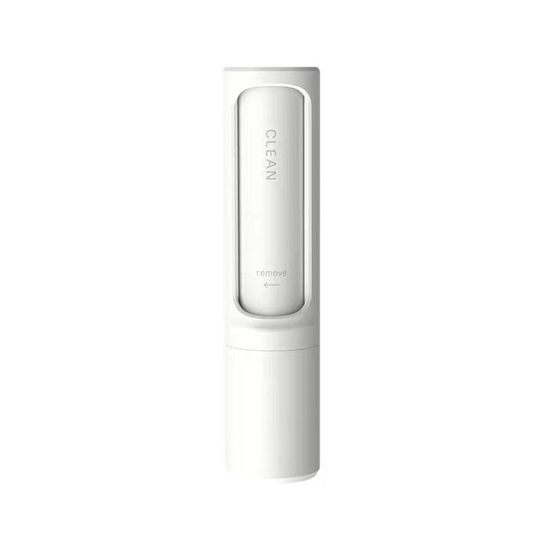 A white, cylindrical self-cleaning pet hair remover tool with "CLEAN" and "remove" text printed on its surface.