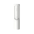 A white, cylindrical self-cleaning pet hair remover tool with "CLEAN" and "remove" text printed on its surface.