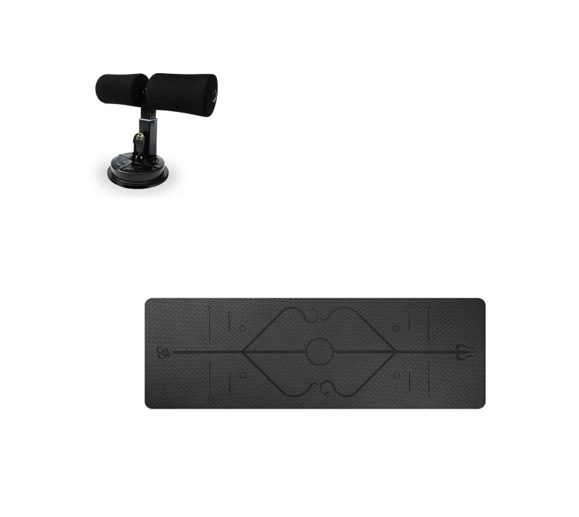 Black sit-up bar with foam-padded feet and a suction cup base, shown with a black yoga mat featuring alignment lines.