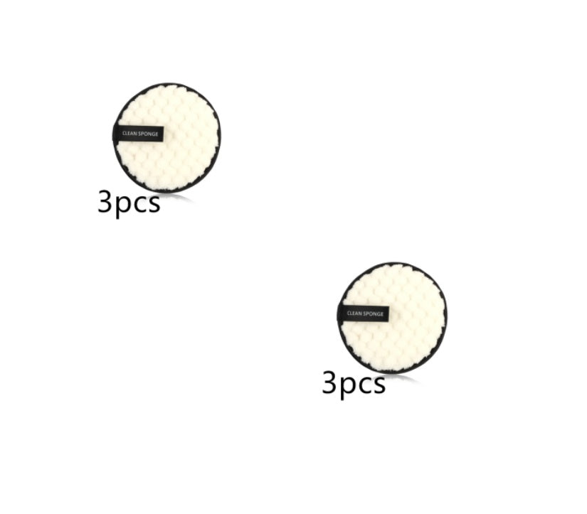 Two round, cream-colored textured makeup puffs with black trim and a "CLEAN SPONGE" tag, labeled "3pcs".