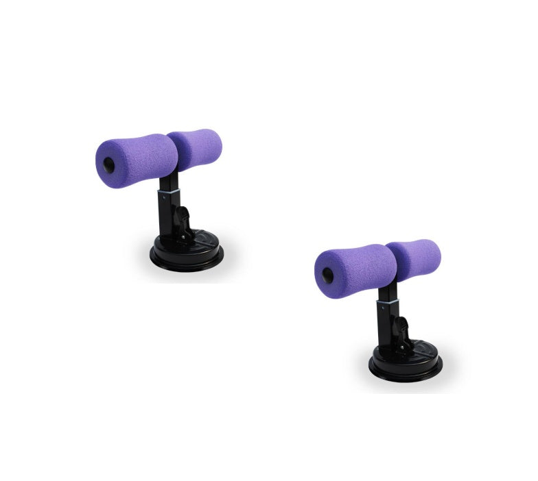 Two black metal sit-up bars with purple foam leg cushions and circular suction cup bases on a white background.
