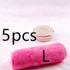 A pink, plush microfiber makeup remover towel next to a Sulwhasoo compact on a soft, white textured background.