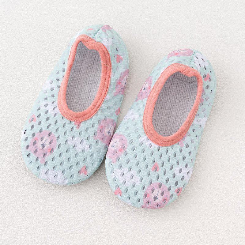 Baby girls' lightweight mint green mesh first-step shoes with cute pink animal patterns and coral-colored trim.