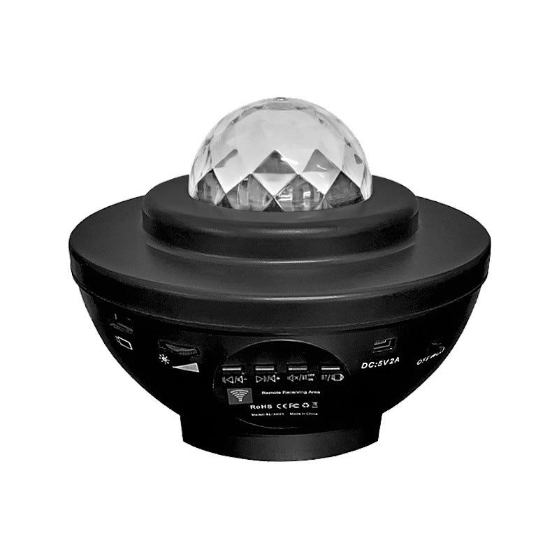 Black UFO-shaped LED projector night light with a crystal dome, music player controls, and USB power port.