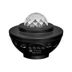 Black UFO-shaped LED projector night light with a crystal dome, music player controls, and USB power port.