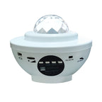 White LED projector night light with a faceted dome, USB port, control buttons, and power switch on a round base.