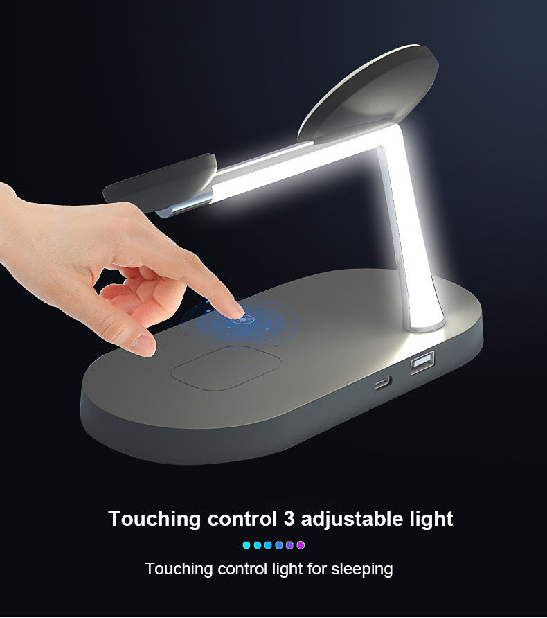 Gray 5-in-1 wireless charging station with built-in LED lamp, touch controls, and phone/watch/earbud magnetic spots.