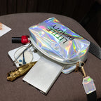 Holographic, waterproof cosmetic bag by Digitaldistribution375 featuring "LITTLE BEAUTY" text and a zipper pull.