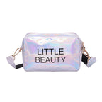 Holographic, waterproof cosmetic bag with "LITTLE BEAUTY" print, zipper closure, and removable shoulder strap.